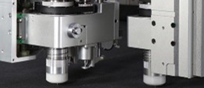 Dual-head asynchronous cutting system